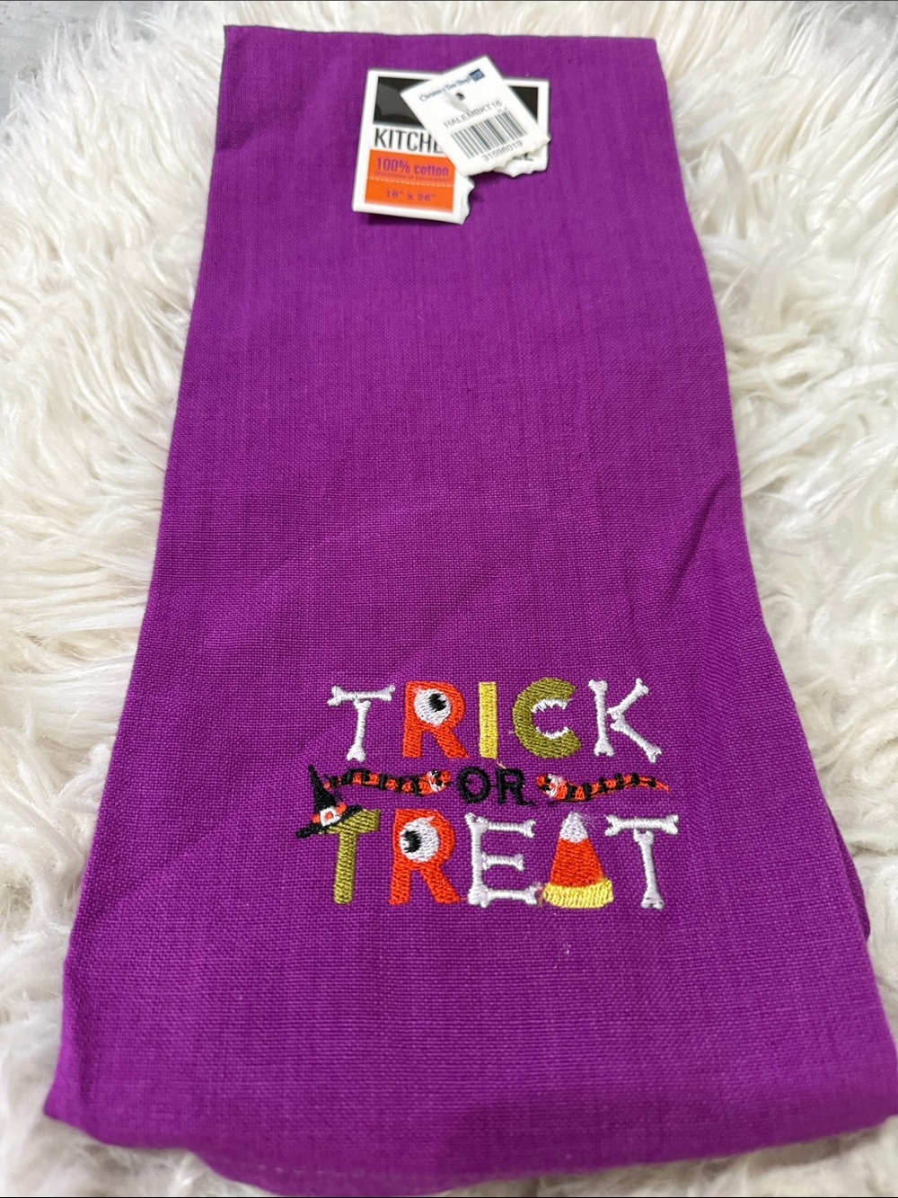 NWT “ Trick or Treat “ Purple Halloween Kitchen Towel .